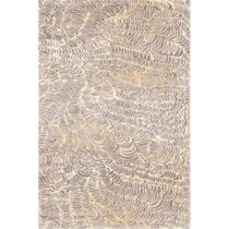 Béžový vlnený koberec 133x180 cm Koi – Agnella (Koberce)