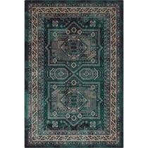 Vlnený koberec v petrolejovomodrej farbe 133x180 cm Mia – Agnella (Koberce)